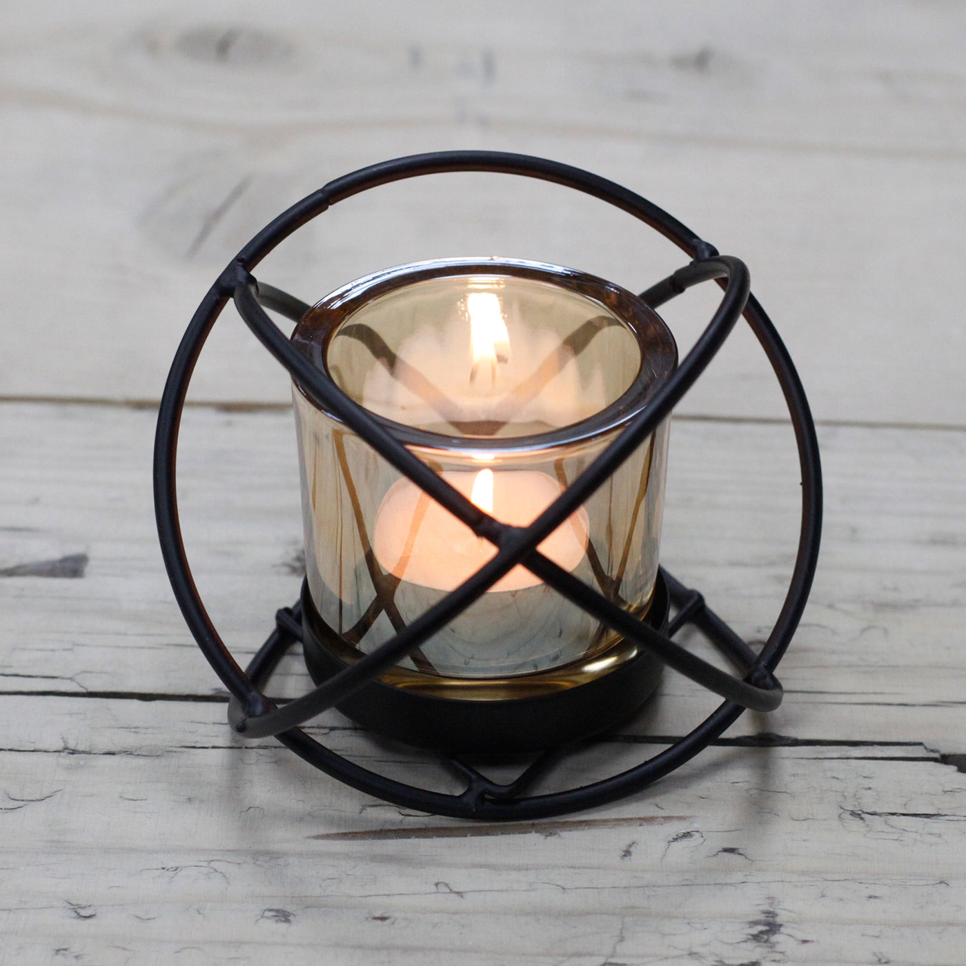  Adorn your table with this candle holder centrepiece and enjoy the peaceful glow of soft natural flicking candle light.