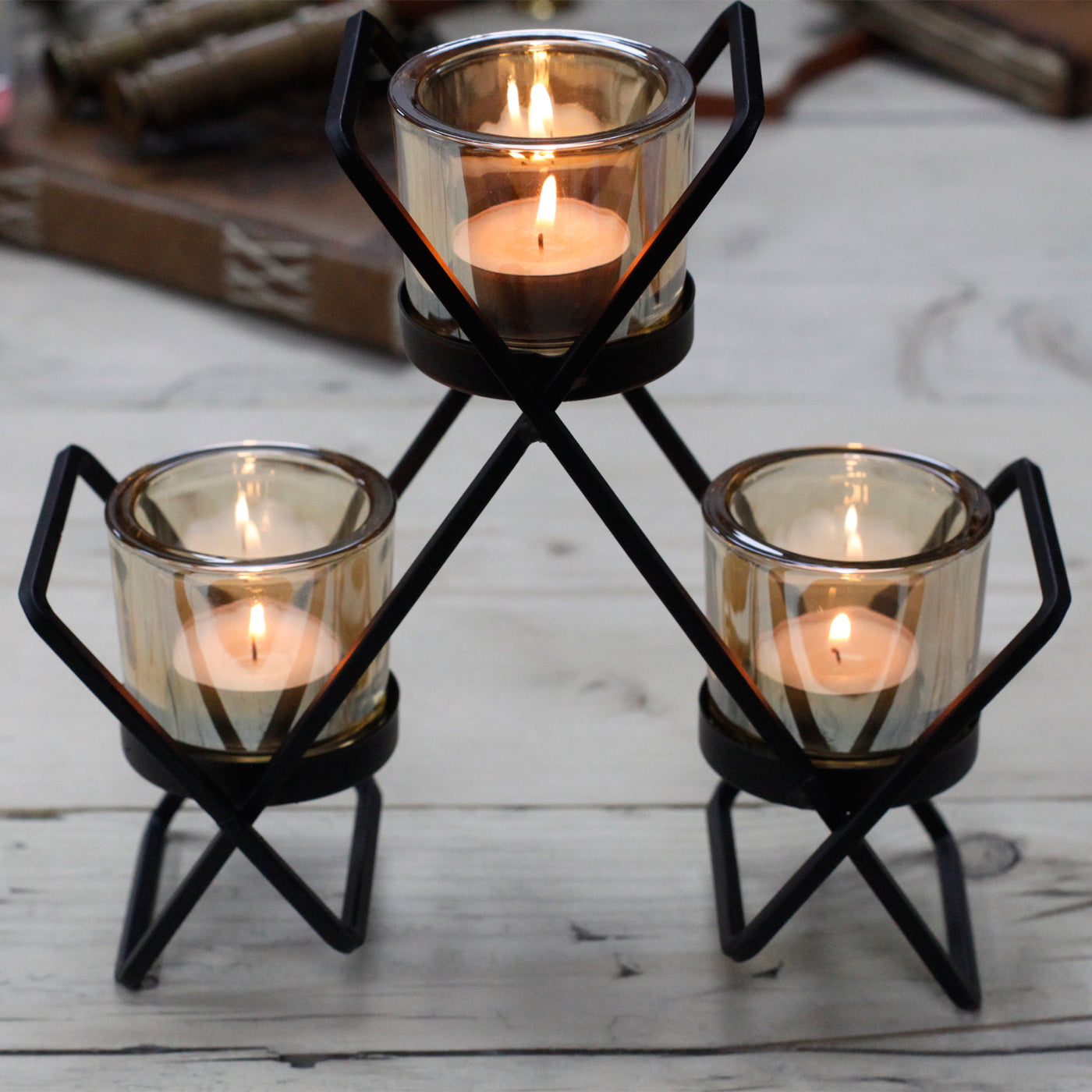  Adorn your table with this candle holder centrepiece and enjoy the peaceful glow of soft natural flicking candle light.